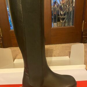 New never worn. Bought at Saks complete with box dust cover soft black leather.